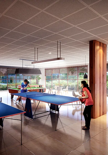 Residents playing table tennis in the games room